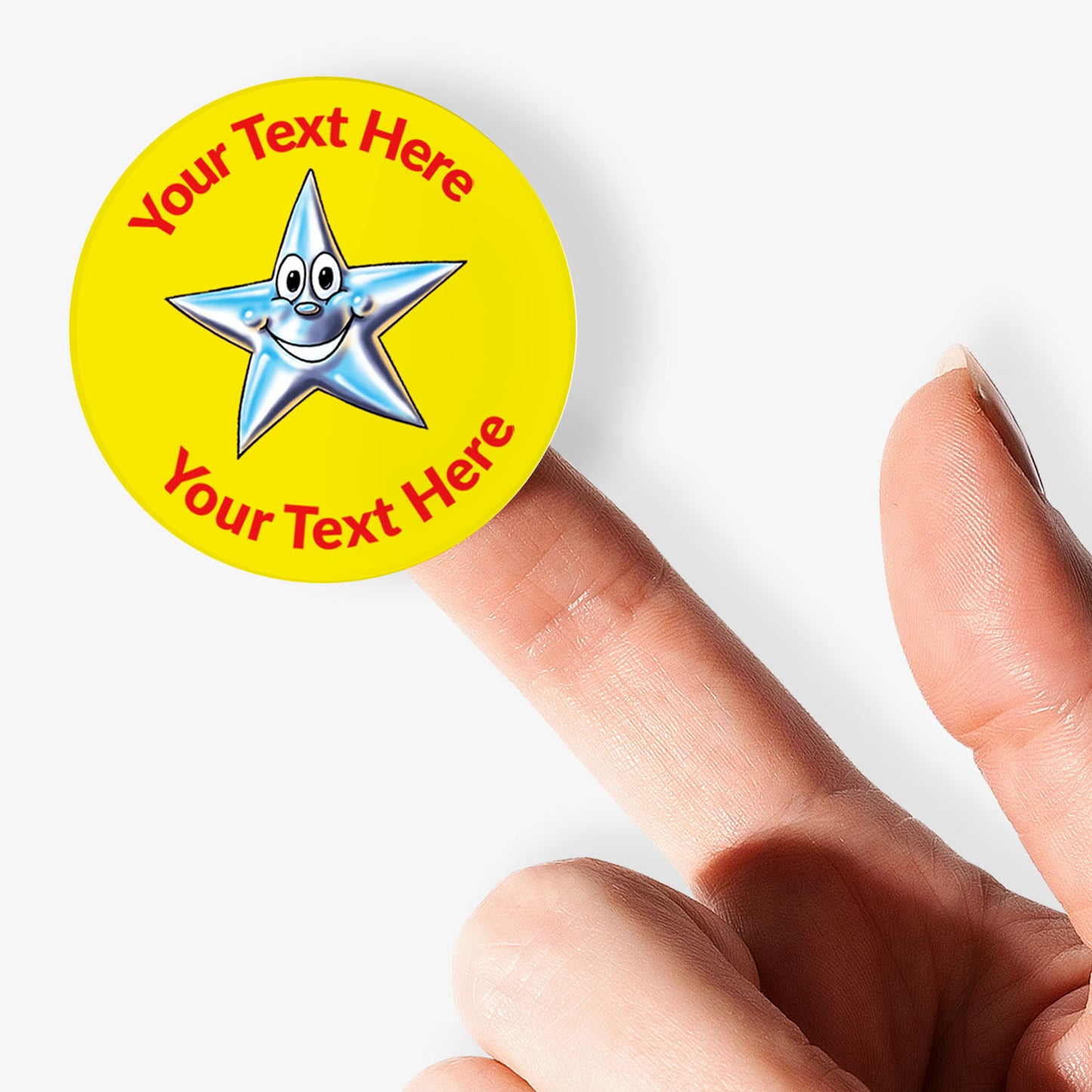 Yellow sticker, on a finger, with a silver smiling star as the central image.  Space for personalisation above and below the image.