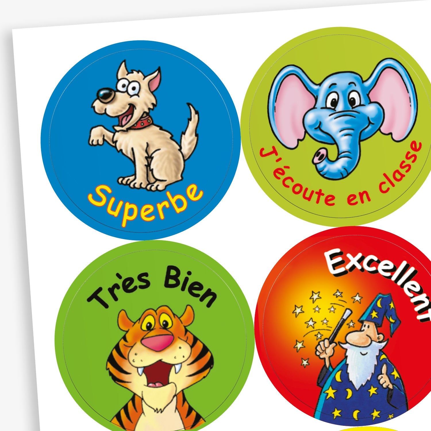 A sheet of colourful reward stickers for children, each with a cartoon character and French text. This includes: a happy dog on a blue background with the word 'Superbe', a smiling elephant on a green background with 'J'écoute en classe', a cheerful tiger on a green background with 'Très Bien' and  a wizard casting stars on a red background with 'Excellent'.