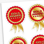 Sheet of dual colour gold and red rosette reward stickers.  The centre of the rosette is either gold with red text, or red with gold text with a large 'Gold Award' central to the design with 5 metallic stars below the text.