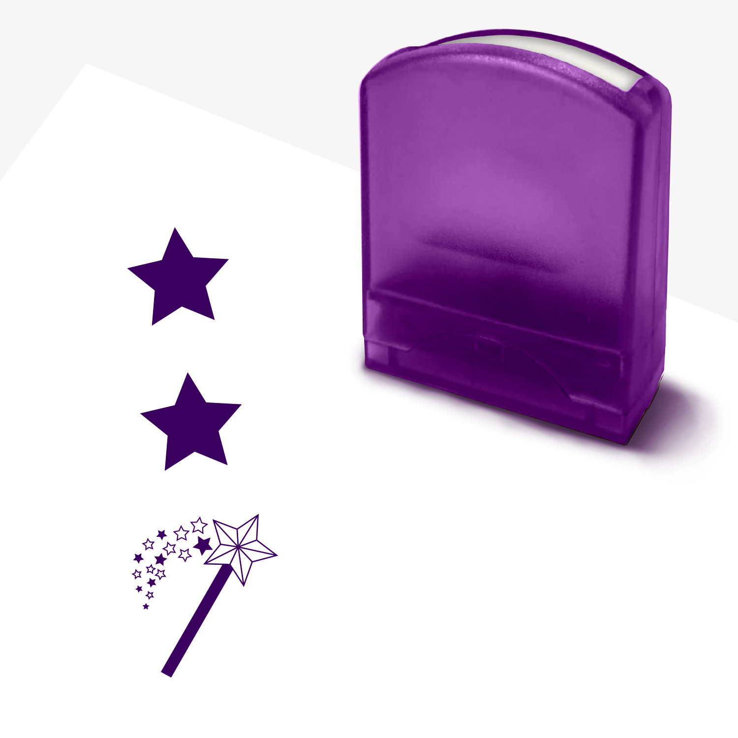 Purple plastic stamper with decorative stars and a wand imprint on a white background