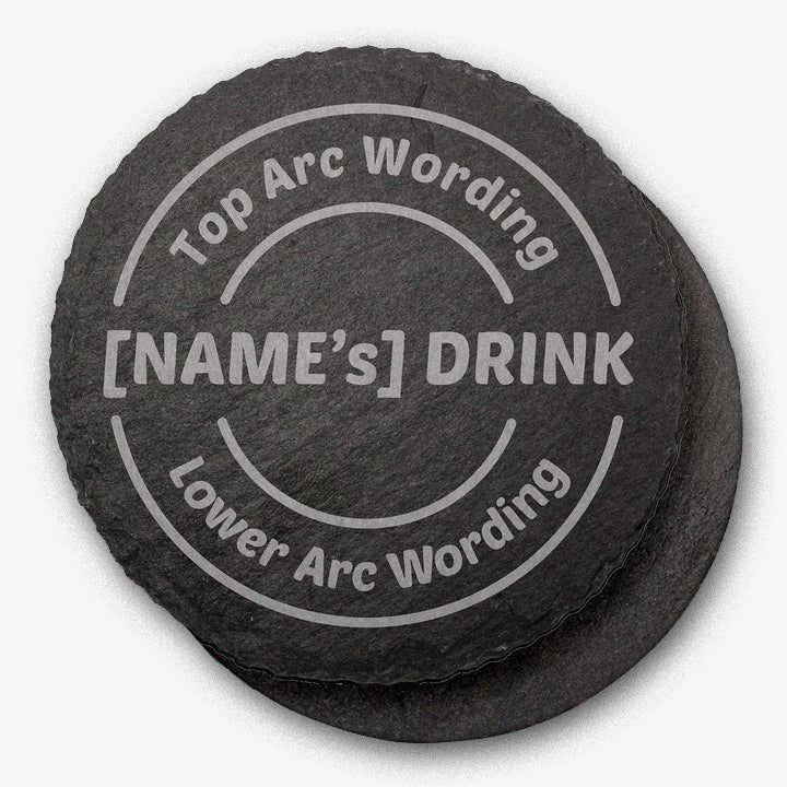 Round black slate drinks coaster with engraved placeholder text reading 'Top Arc Wording', '[NAME’s] DRINK', and 'Lower Arc Wording', designed for personalisation.