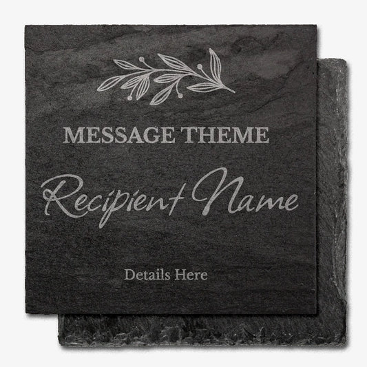 A rough edged, square black slate coaster with engraved customisable text. At the top is a delicate leaf motif. Below that, placeholder text reads 'MESSAGE THEME' in uppercase, followed by 'Recipient Name' in a large cursive font, and 'Details Here' in smaller print at the bottom.