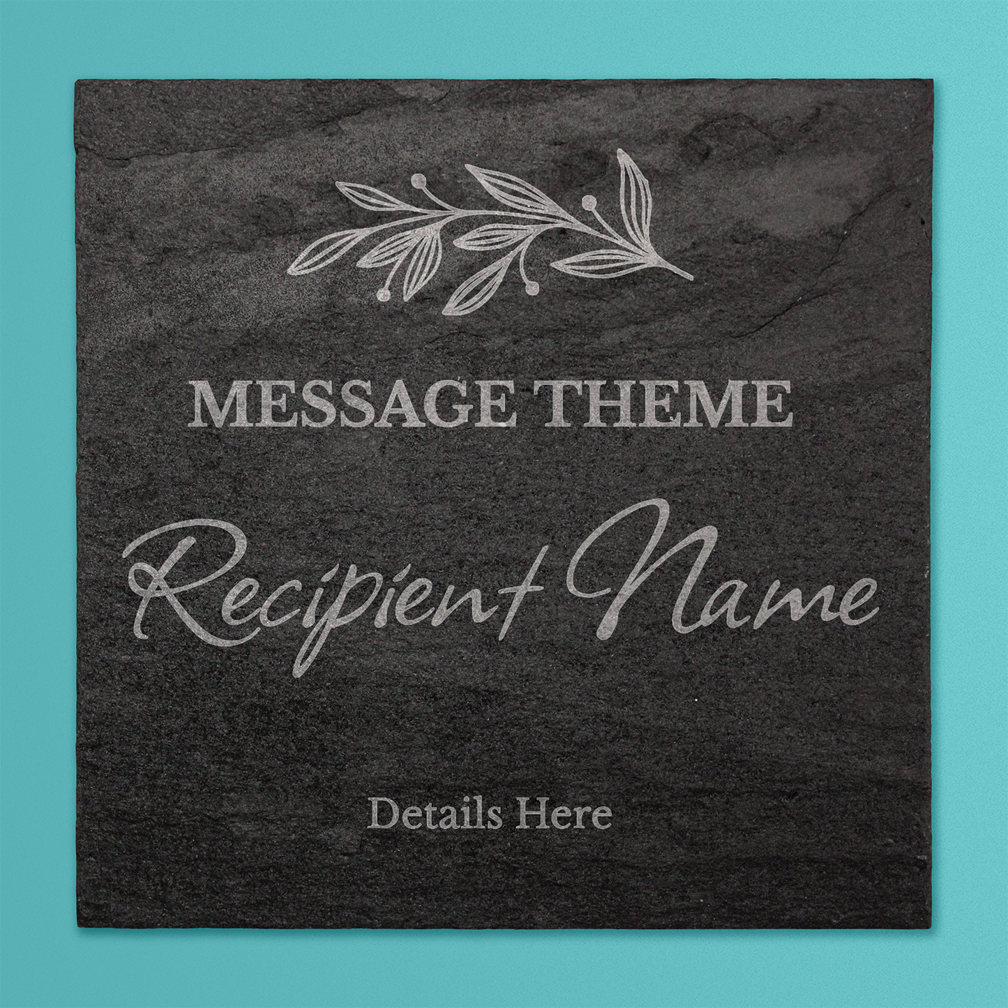 A square black slate coaster with engraved customisable text. At the top is a delicate leaf motif. Below that, placeholder text reads 'MESSAGE THEME' in uppercase, followed by 'Recipient Name' in a large cursive font, and 'Details Here' in smaller print at the bottom.
