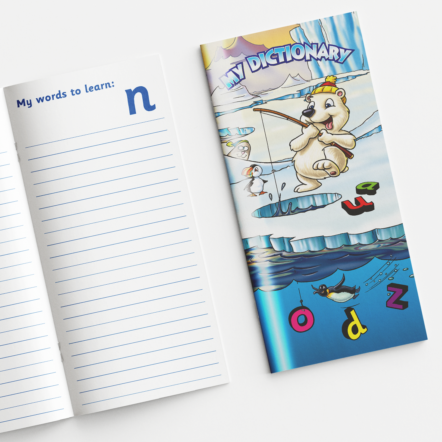 A children's illustrated dictionary titled 'My Dictionary' with a polar-themed cover featuring a polar bear fishing on ice, penguins, and colourful floating letters in the water. The inside page shown is titled 'My words to learn:' with lined space for writing and the letter 'n' at the top, indicating a section for vocabulary beginning with 'n'.