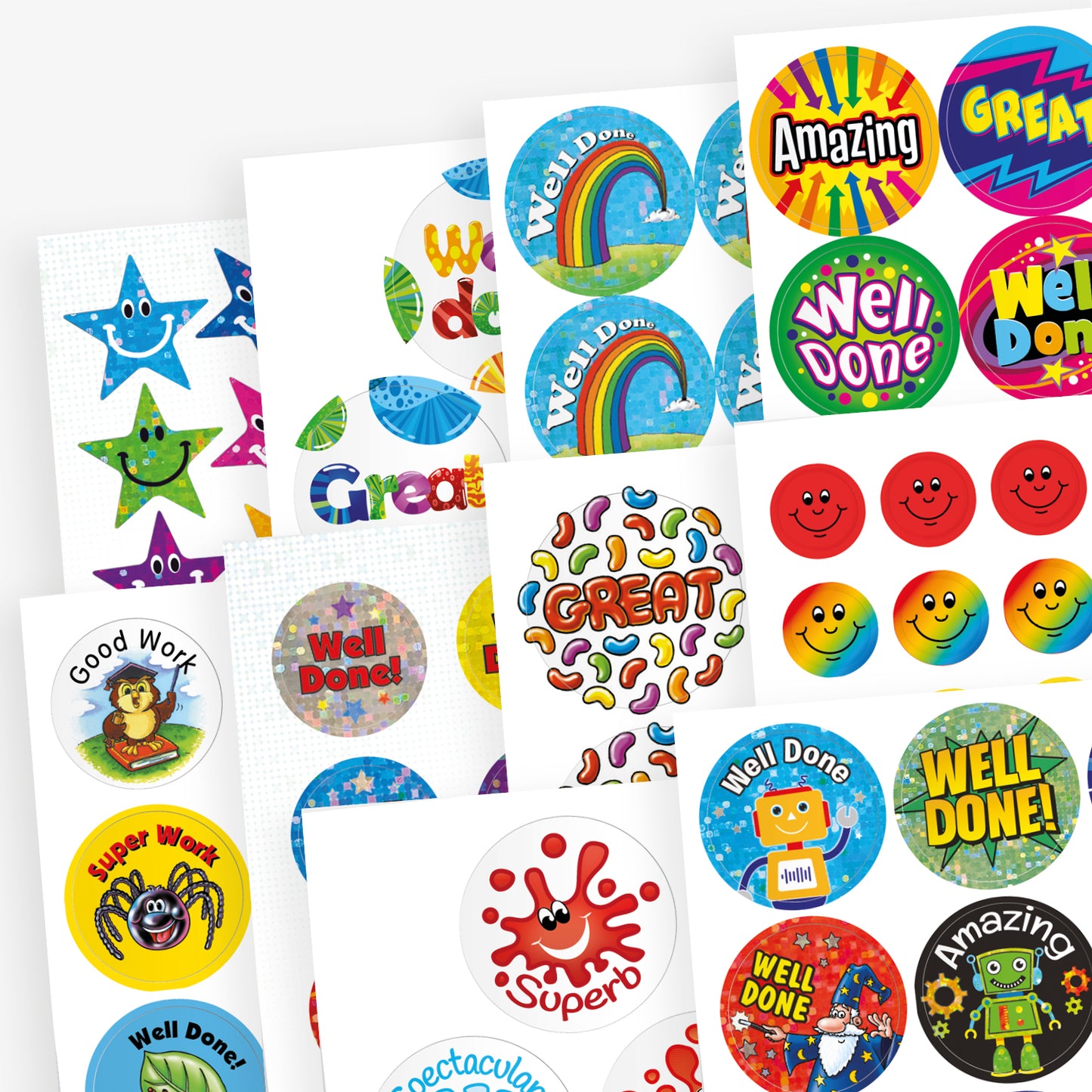 A variety of colourful reward stickers with motivational phrases such as 'Well Done', 'Amazing', 'Great', 'Superb', and 'Spectacular'. Designs include rainbows, stars, smiley faces, cartoon animals, and fun characters like robots and splats. The stickers come in various colours and patterns, intended to recognise and encourage positive behaviour or achievement