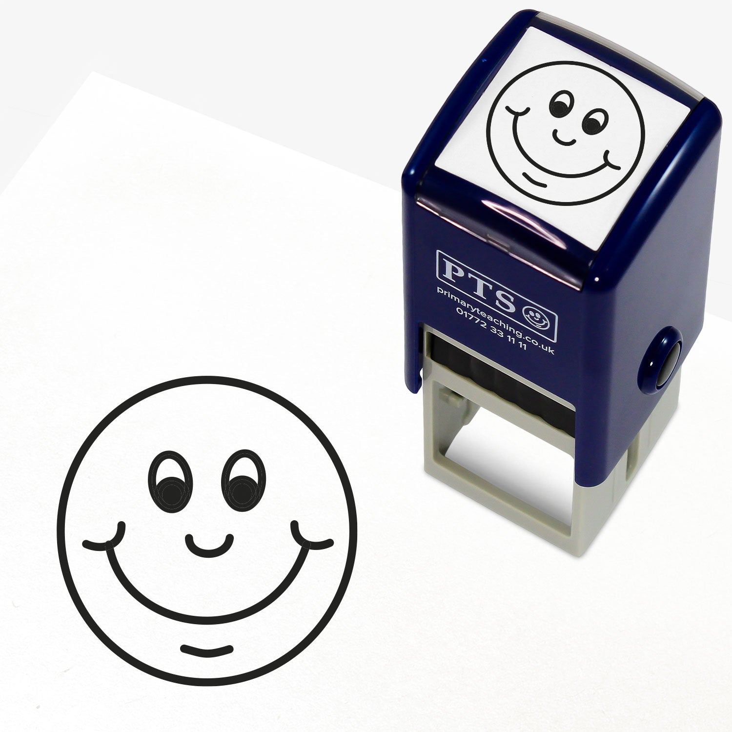 Black 25mm pre-inked stamper featuring a cheerful smiley face design, with customisable text above and below the image, ideal for classroom marking and pupil encouragement.