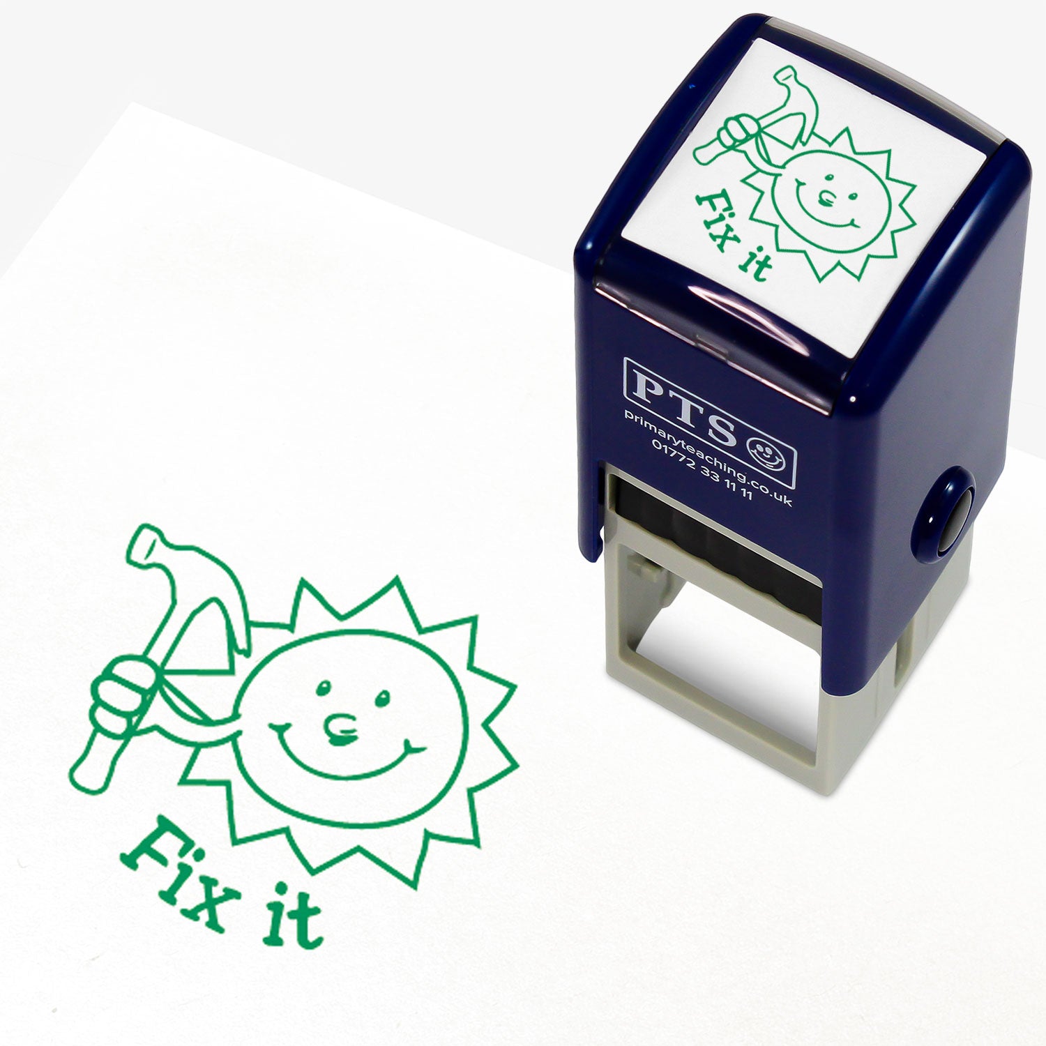25mm self-inking stamper with green ink.  The stamp impression is a green outline of a smiling sun holding a hammer above the wording 'Fix it'.