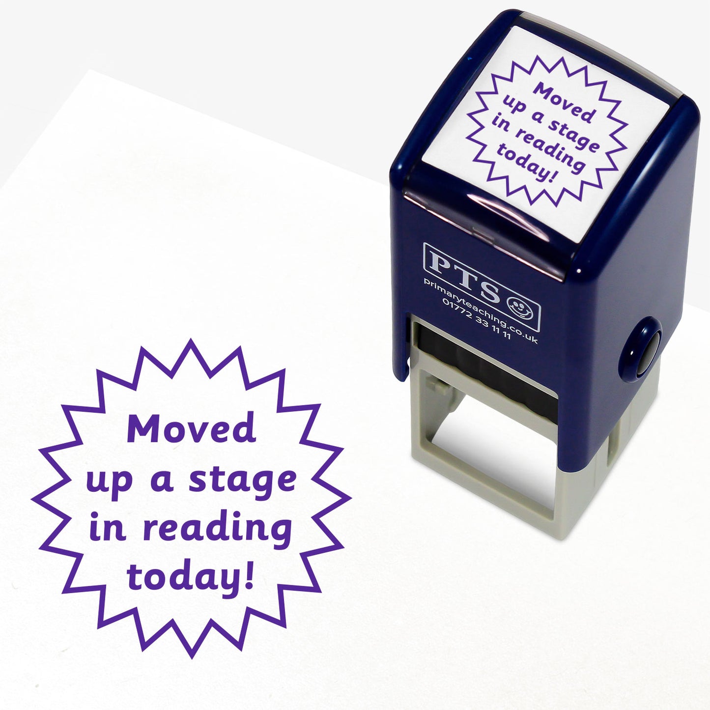 A 25mm round pre-inked teacher stamper with purple ink, featuring the wording 'Moved up a stage in reading today!' within a starburst.