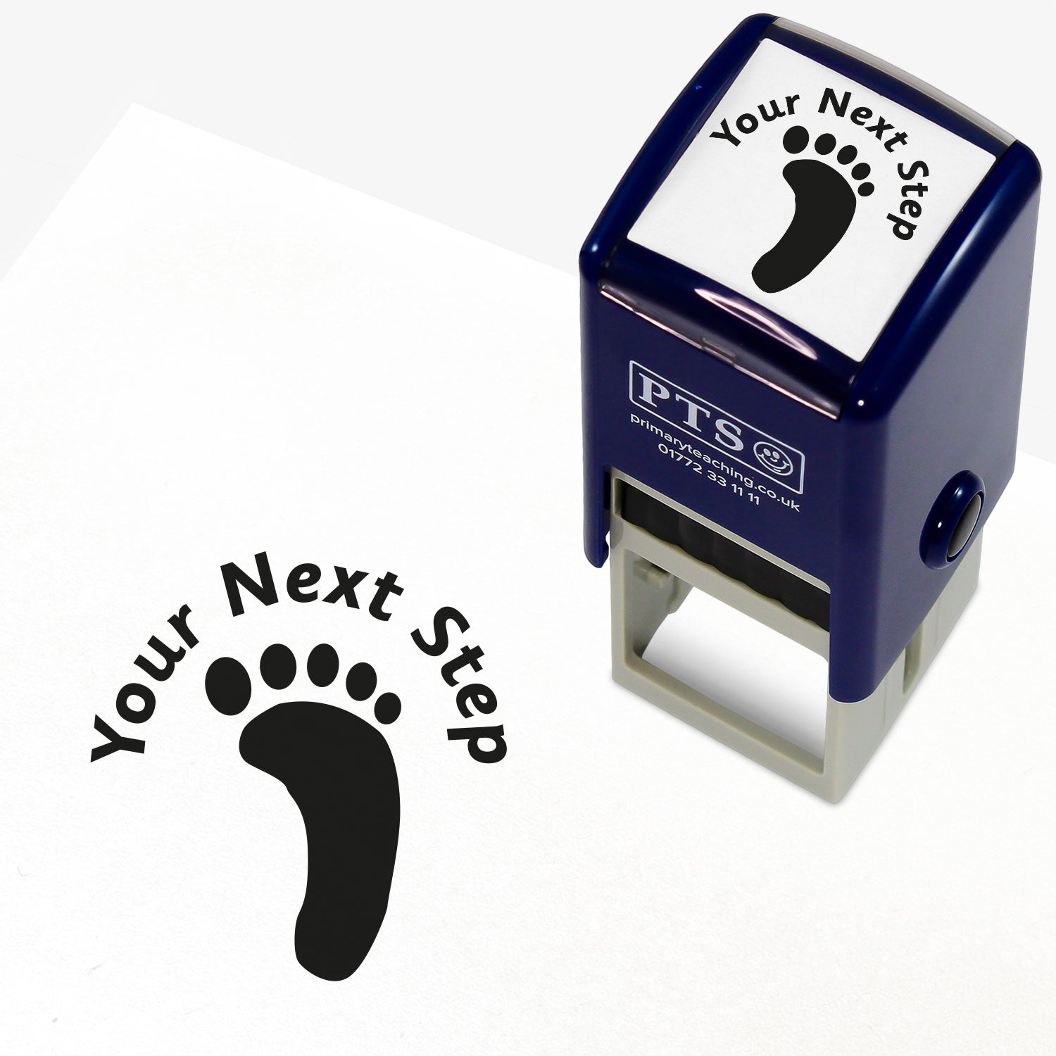 Black 10mm pre-inked stamper featuring a footprint with the phrase 'Your Next Step' above.