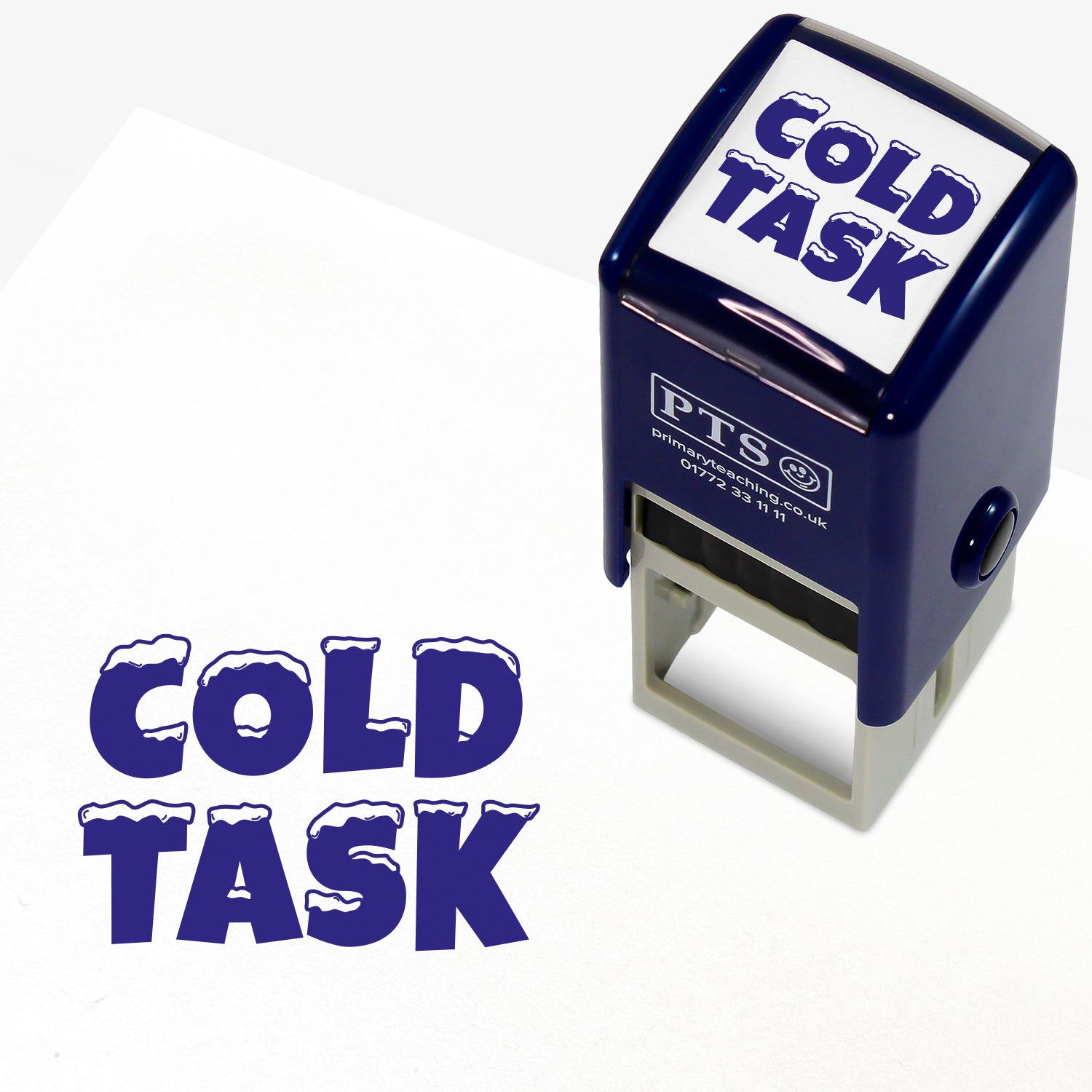 25mm self-inking stamper with blue ink.  The stamp impression is the phrase 'COLD TASK' with snow capping each letter.