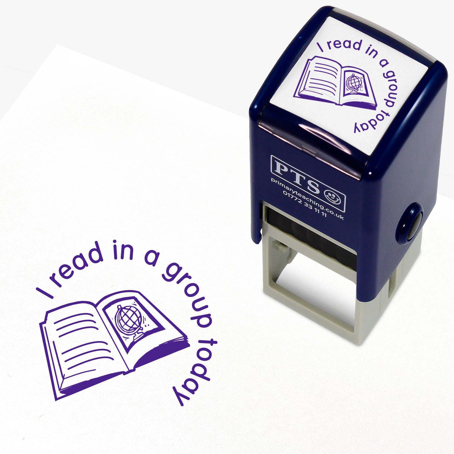 25mm self-inking stamper with purple ink, featuring the phrase 'I read in a group today' in a curved font above an open book illustration with a globe; ideal for marking pupils' reading records.