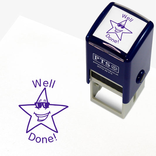 Well Done Star with Sunglasses Stamper featuring a 25mm circular stamp design with a smiling star character wearing sunglasses and the text 'Well Done!' in bold purple letters. The stamper has a dark blue casing, ideal for rewarding pupil achievements.