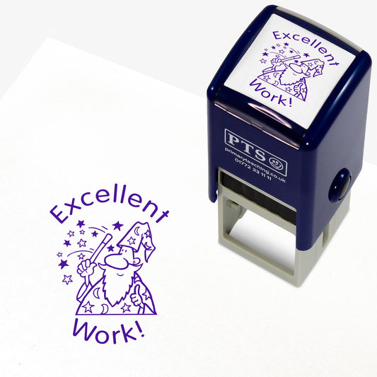 The image shows a 25mm stamper with the phrase 'Excellent Work!' alongside a graphic of a wizard. An example of the stamp's imprint is also displayed, demonstrating the purple ink used.