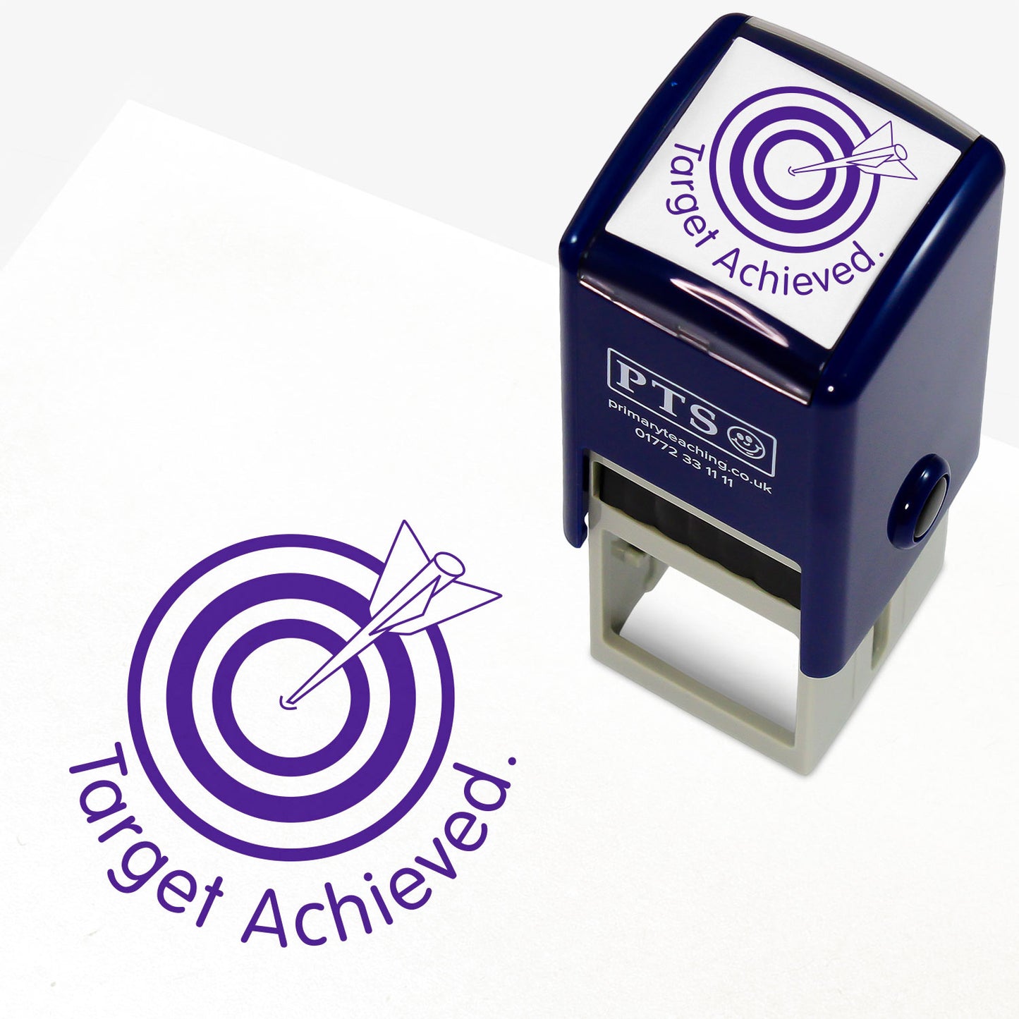 Purple ink 25mm pre-inked stamper featuring an arrow hitting a bullseye in a target with the phrase 'Target Achieved' underneath.