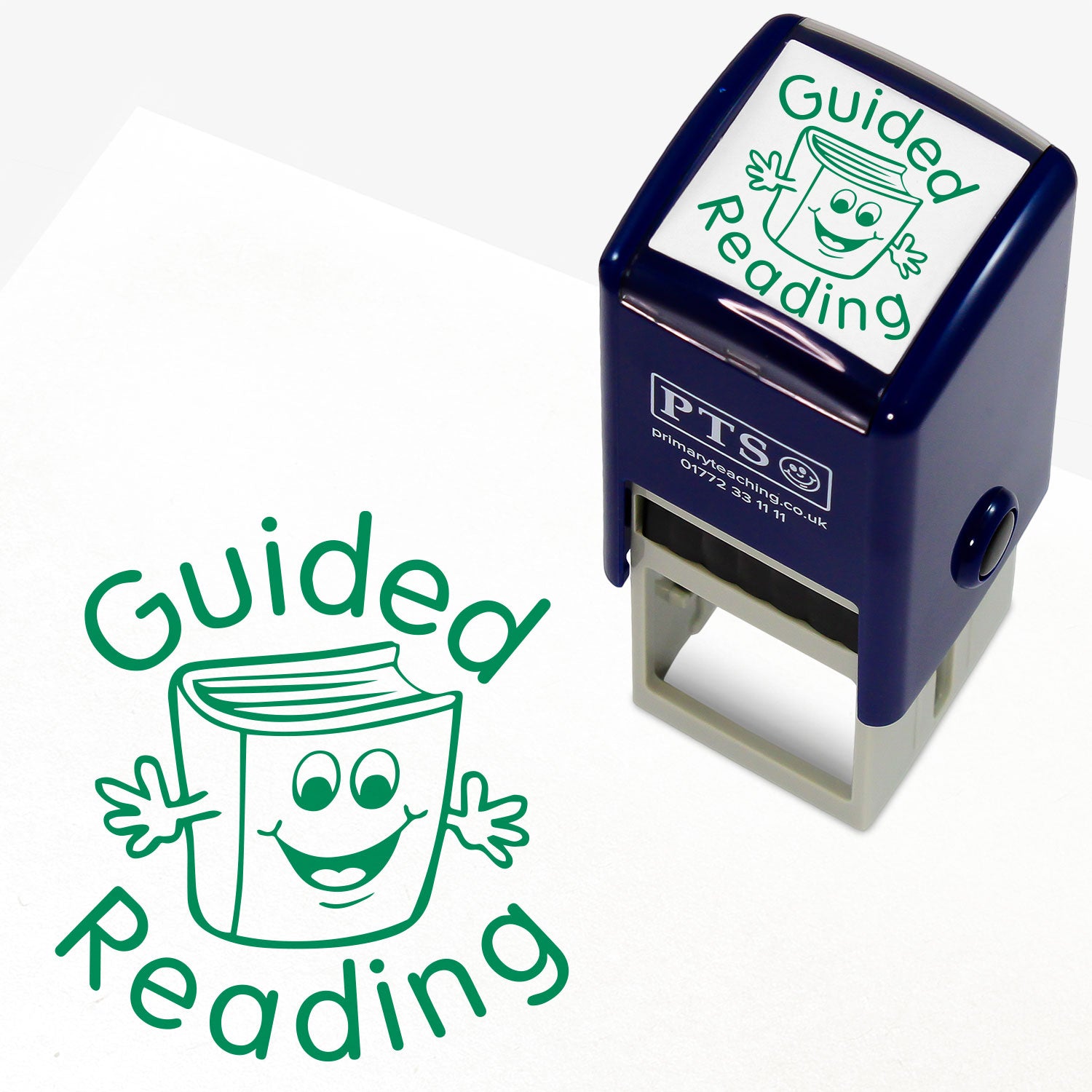 Square 25mm stamper with purple ink, featuring the central image of a cartoon smiling book giving jazz hands encircled by the phrase 'Guided Reading'.