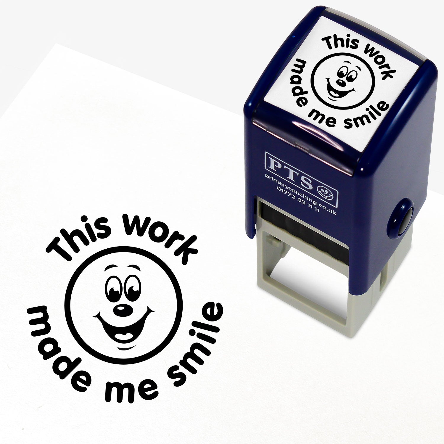 Black ink 25mm pre-inked stamper featuring a smiling emoji face surrounded by the phrase 'This work made me smile'.