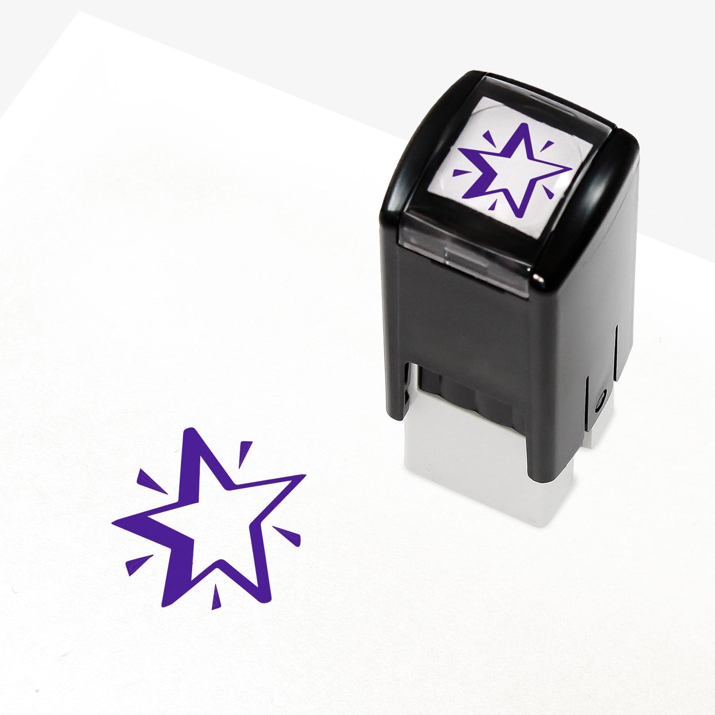 A 10mm self-inking stamp with a purple star central to the design.