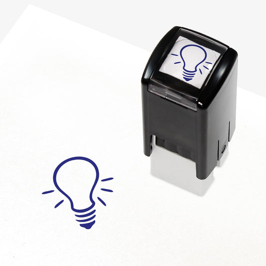 A 10mm self-inking stamp with a blue lightbulb outline central to the design