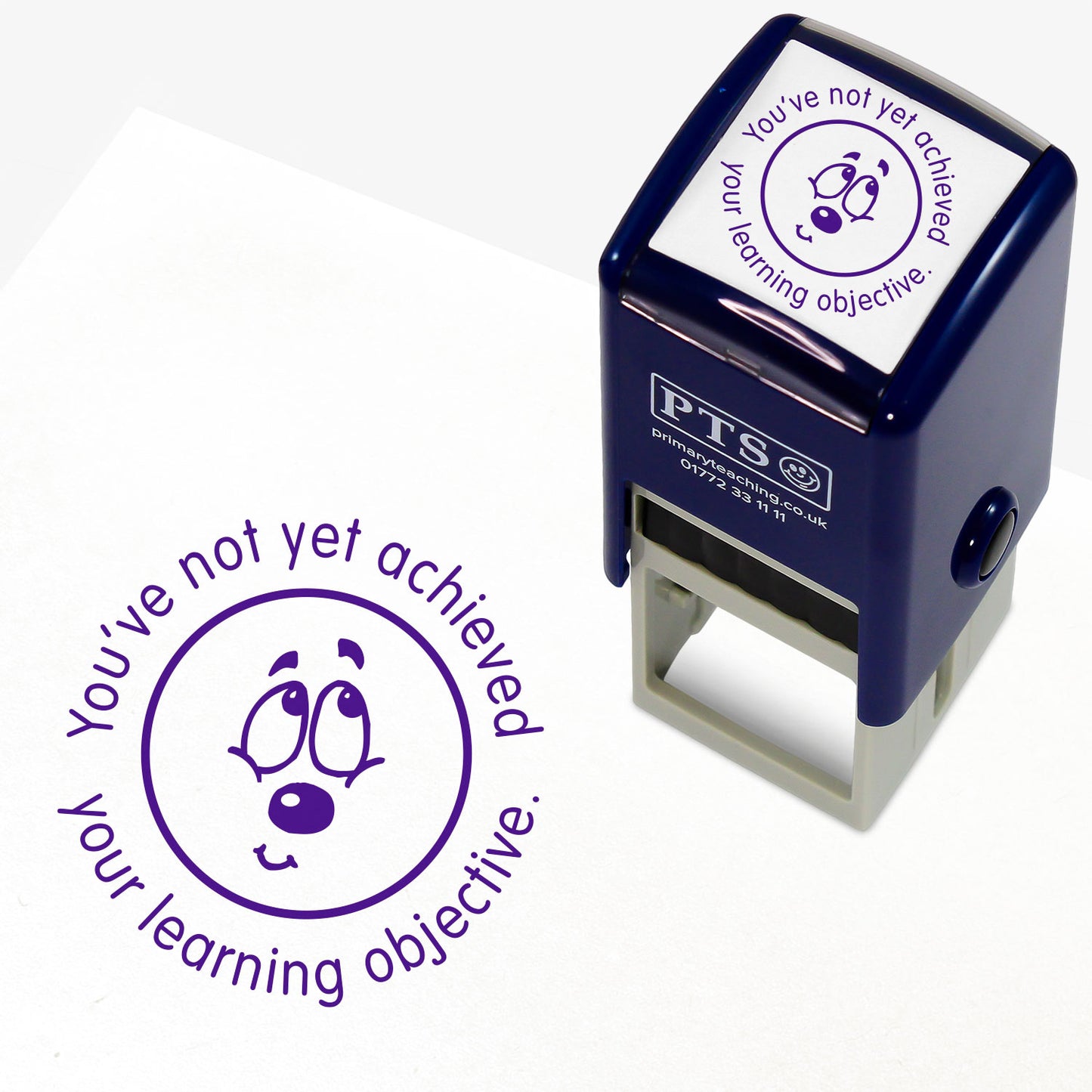 Purple 25mm pre-inked stamper featuring a bashful emoji face surrounded by the phrase 'You've not yet achieved your learning objective'.