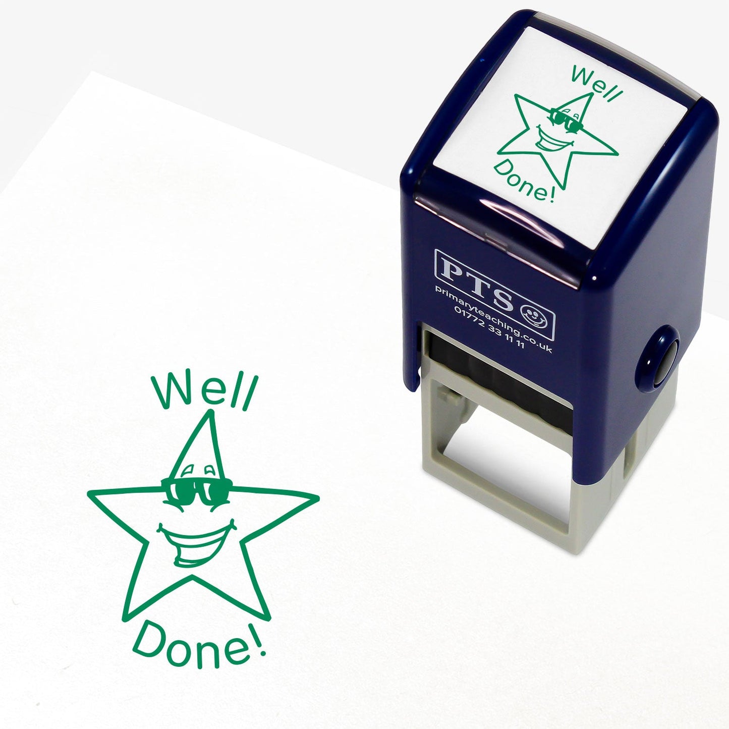 Well Done Star with Sunglasses Stamper featuring a 25mm circular stamp design with a smiling star character wearing sunglasses and the text 'Well Done!' in bold green letters. The stamper has a dark blue casing, ideal for rewarding pupil achievements.