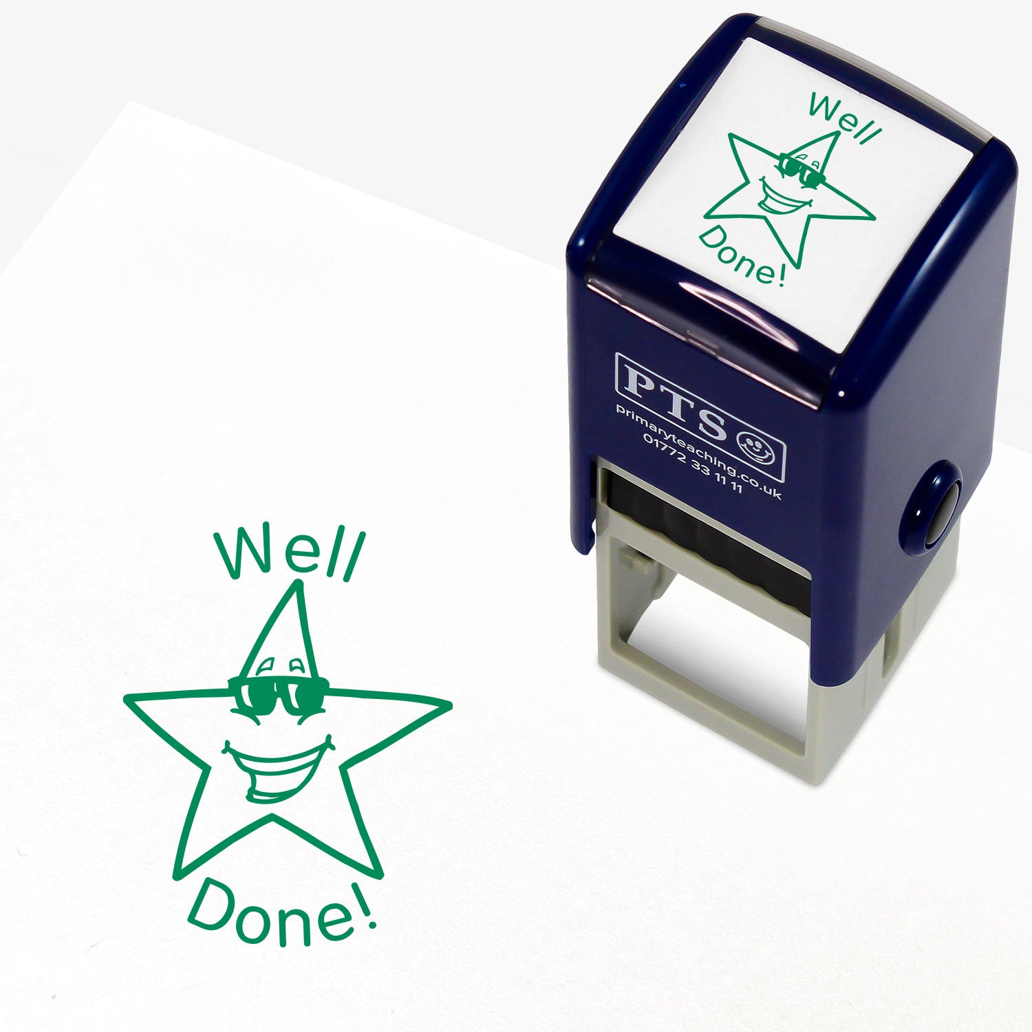 Well Done Star with Sunglasses Stamper featuring a 25mm circular stamp design with a smiling star character wearing sunglasses and the text 'Well Done!' in bold green letters. The stamper has a dark blue casing, ideal for rewarding pupil achievements.