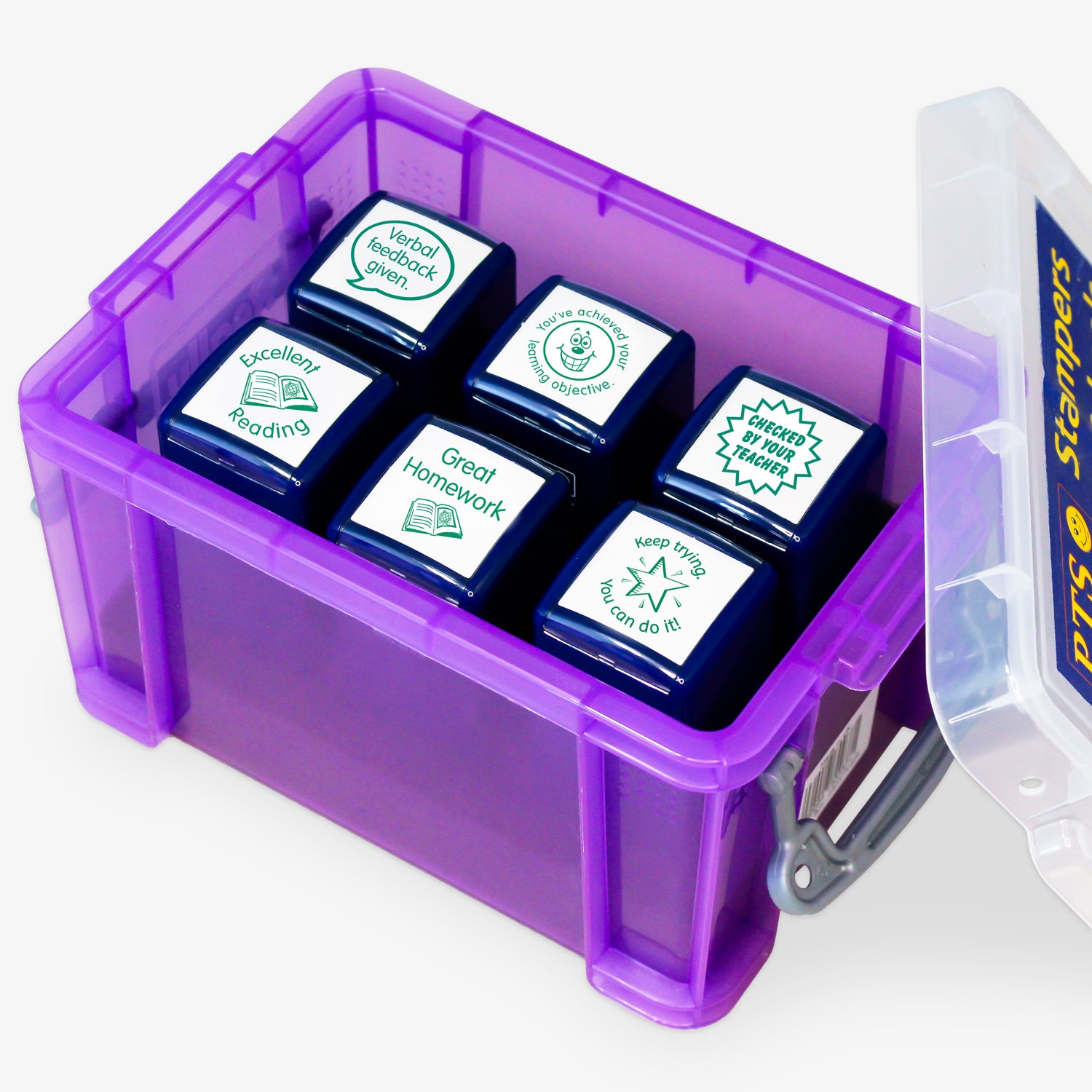 Set of six 25mm self-inking literacy stampers housed in a purple plastic storage box; each stamper features a unique green-inked design to speed up marking