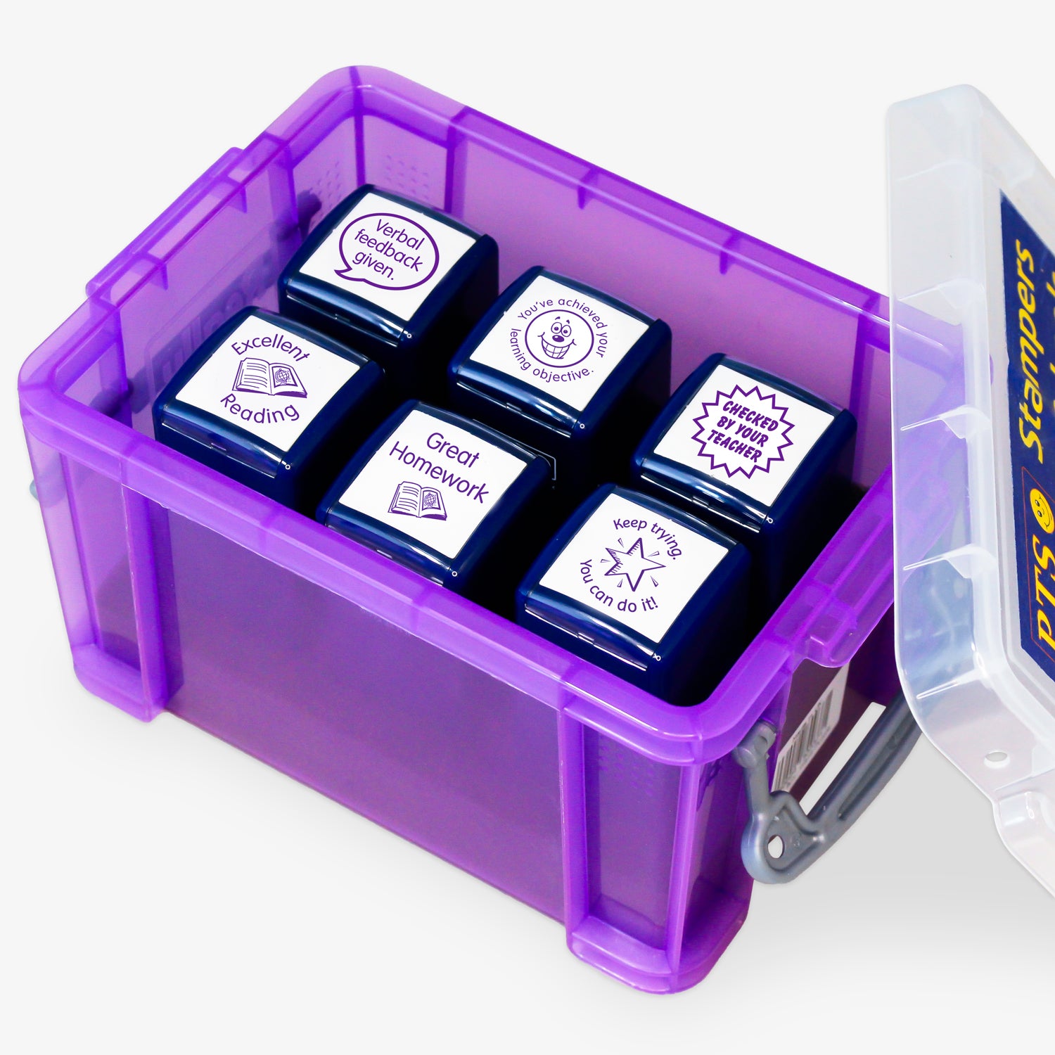 Set of six 25mm self-inking literacy stampers housed in a purple plastic storage box; each stamper features a unique purple-inked design to speed up marking