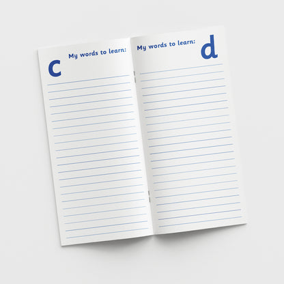 The inside pages showing are titled 'My words to learn:' with lined writing space and the letter 'c' at the top on the left page and the letter 'd' at the top on the right page indicating a section for vocabulary starting with that letter.