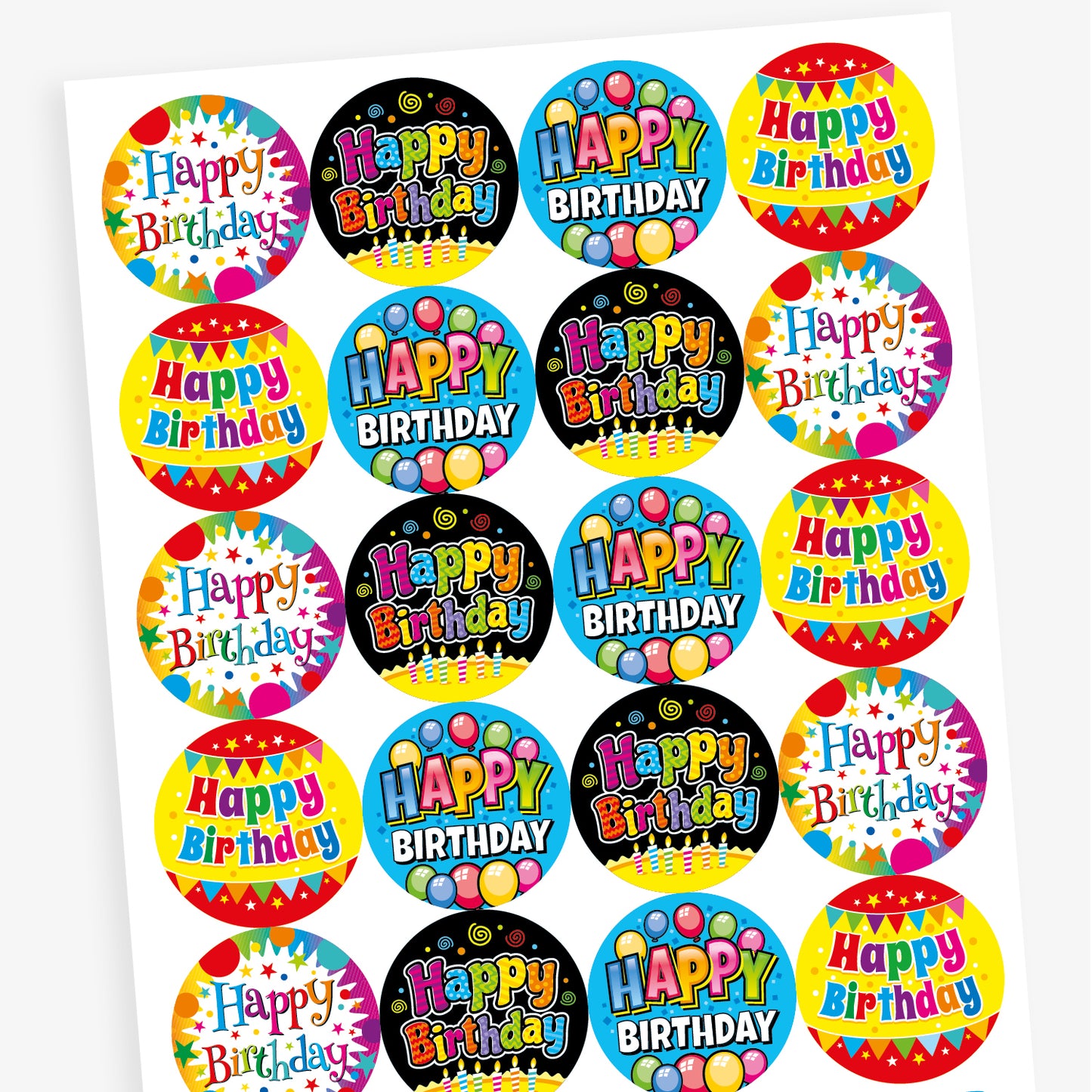 A sheet of circular 'Happy Birthday' stickers featuring various vibrant designs. Each sticker includes colourful text and festive decorations such as balloons, candles, stars, and bunting, with background colours including black, blue, yellow, and multicolour.