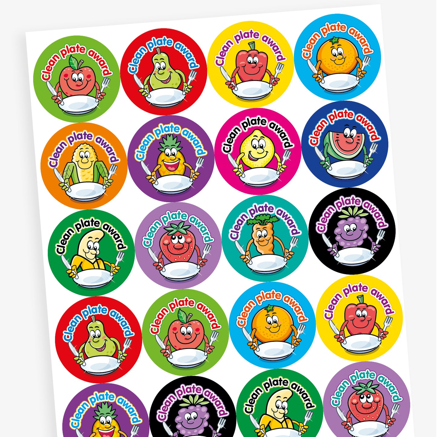 A sheet of colourful circular 'Clean Plate Award' stickers featuring smiling cartoon fruits and vegetables, such as an apple, pear, corn, and pineapple, each holding a knife and fork with an empty plate. Background colours include green, red, orange, and purple.