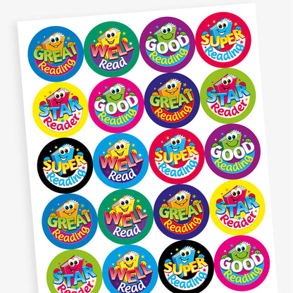 Sheet of colourful round reading reward stickers featuring cartoon book characters with smiling faces. Phrases include 'Great Reading', 'Well Read', 'Star Reader', and 'Good Reading', each in bold, playful fonts on vibrant backgrounds such as blue, green, yellow, and pink.
