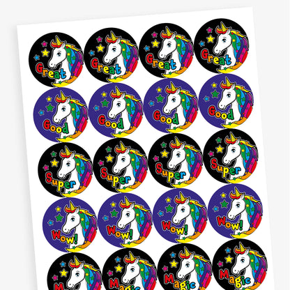 Sheet of 20 round vibrant-coloured stickers, each 32mm in diameter, featuring a white unicorn with a rainbow mane and horn, surrounded by stars. Each sticker displays one of five motivational words: 'Great', 'Magic', 'Super', 'Wow!', or 'Good'.