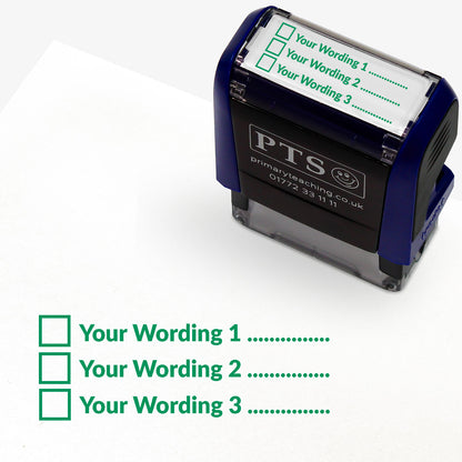 A  self-inking stamp with a customisable label displaying three green tick boxes, each followed by the placeholder text 'Your Wording 1', 'Your Wording 2', and 'Your Wording 3', printed in green with dotted lines. 