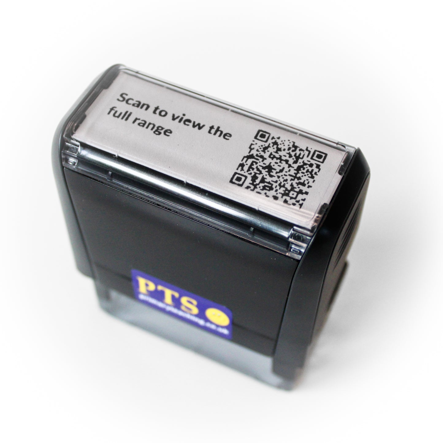 Black self-inking stamp with custom QR code design and the text “Scan to view the full range” printed on the stamp top.