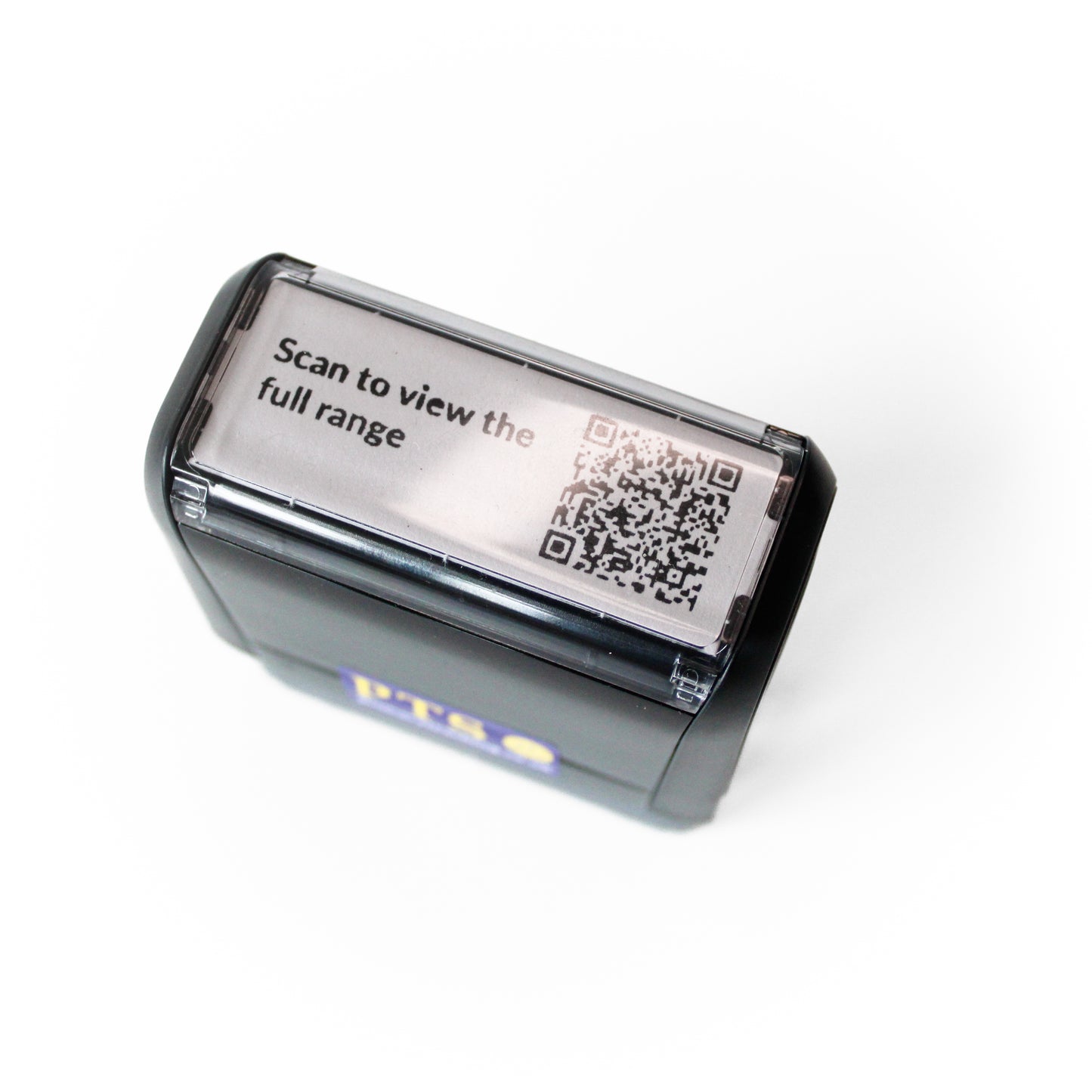 Close-up angled view of a personalised self-inking QR code stamp with “Scan to view the full range” printed on the top label.