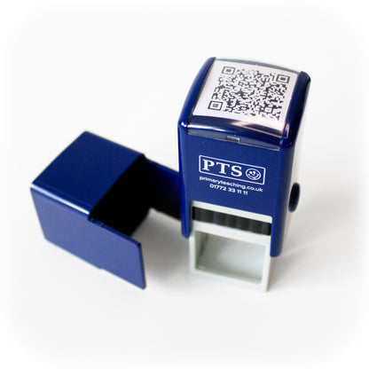 Close-up of a black personalised QR code stamper with removable cap and custom QR code displayed on the top.