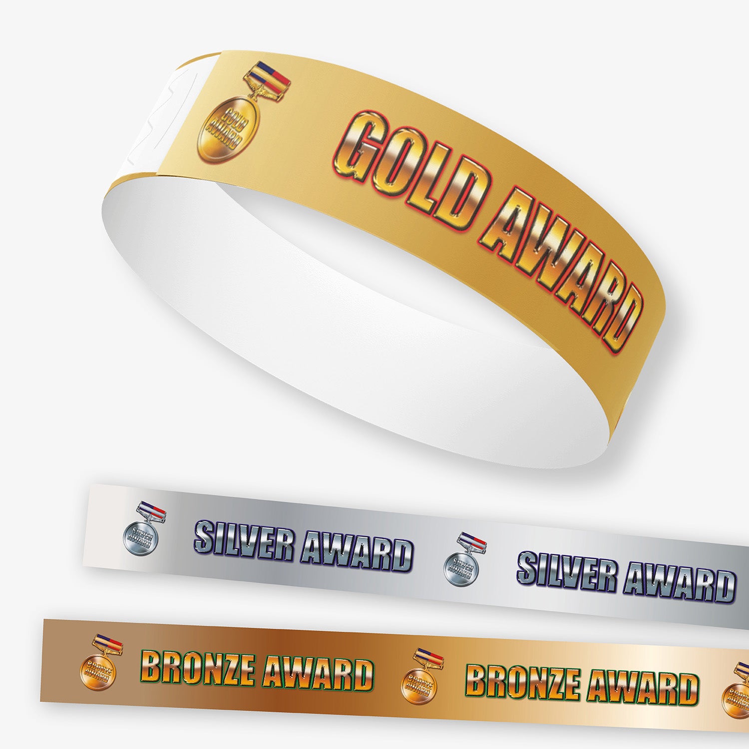 Gold, silver, and bronze award wristbands on a white background