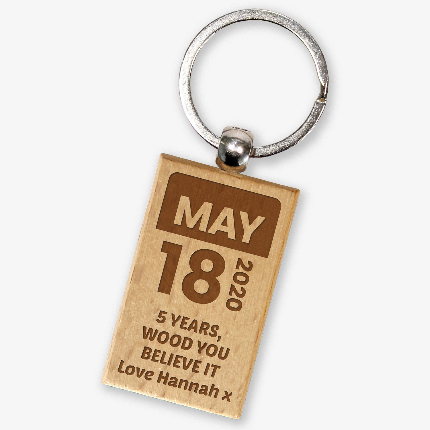 A wooden keyring with a stainless steel keychain, featuring the engraved text 'MAY 18 2020, WOOD YOU BELIEVE IT Love Hannah x'.