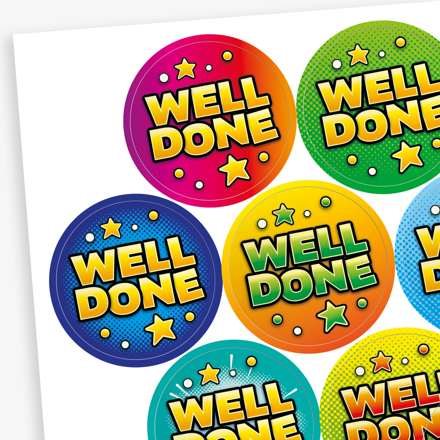 Close-up of colourful 'Well Done' stickers, orange zest scented.