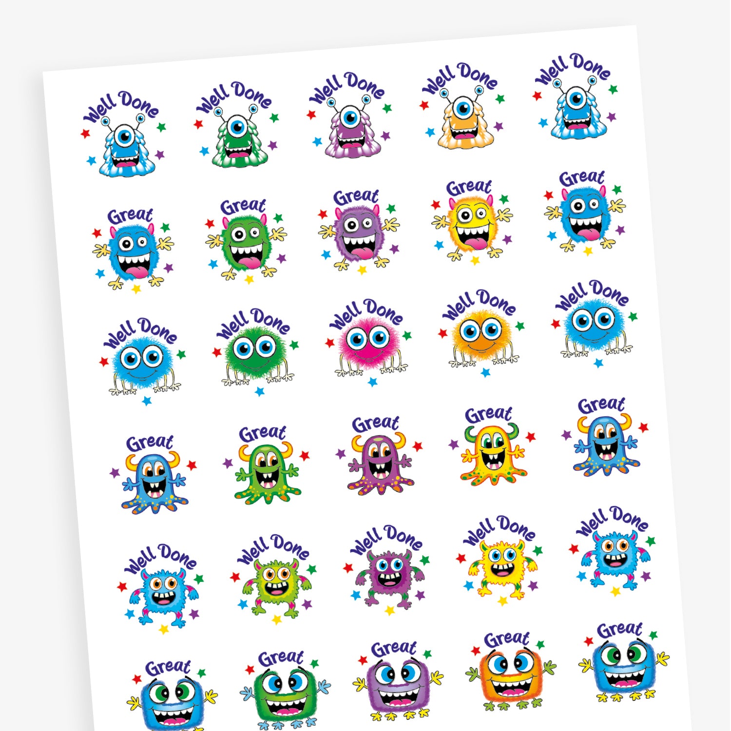 Sheets of 25mm circular stickers featuring colourful cartoon monsters with expressive faces, each accompanied by motivational phrases such as 'Well Done' and 'Great', designed to be berry-scented when rubbed.