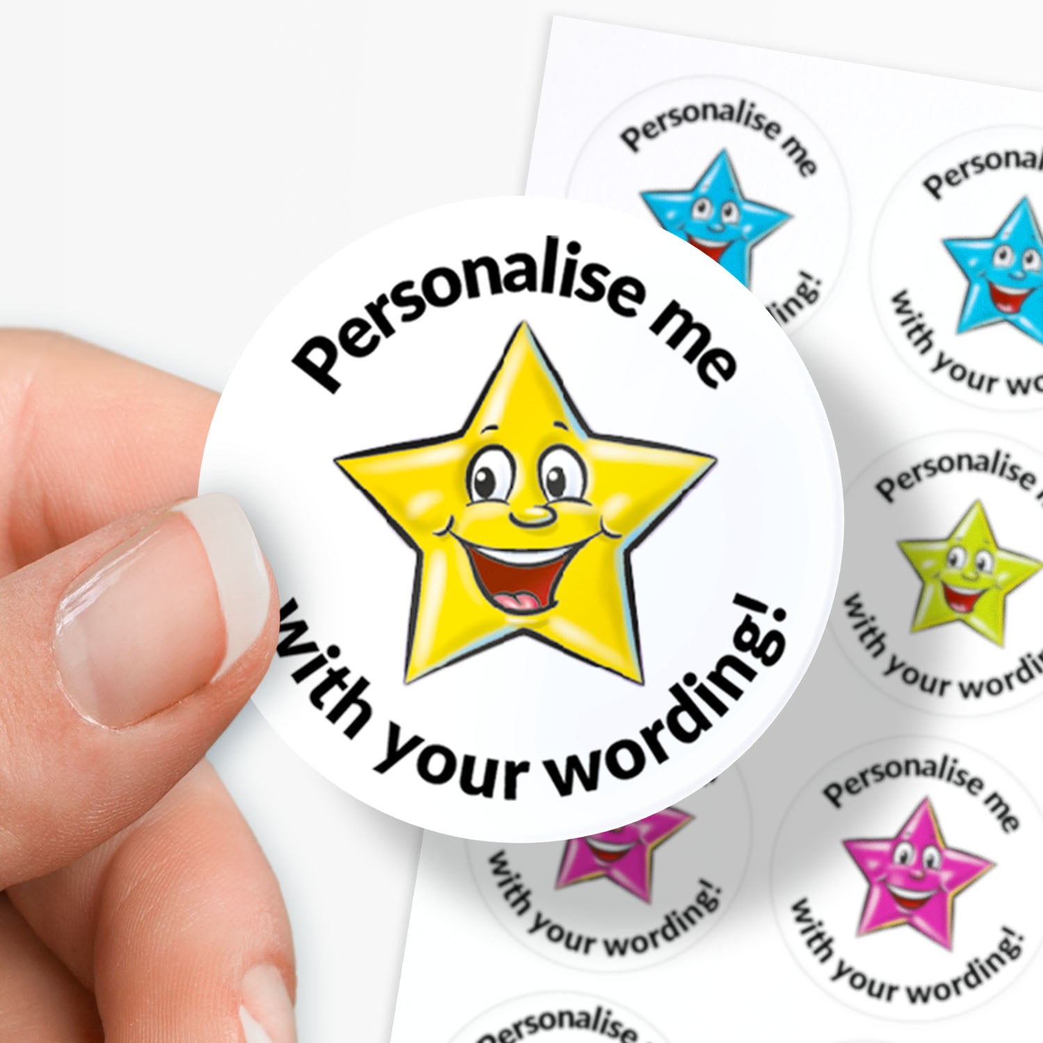 Star-shaped sticker with a smiley face and text 'Personalise me with your wording!' held by a hand.
