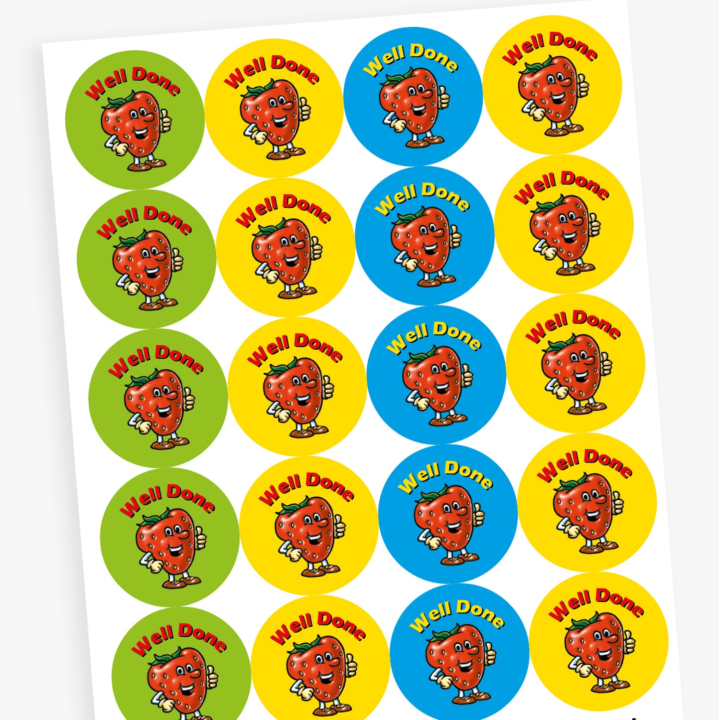 Sheet of strawberry scented, colourful round reward stickers featuring a smiling cartoon strawberry character giving a thumbs up. Each sticker has the text 'Well Done' at the top and comes in green, yellow, red, and blue backgrounds.