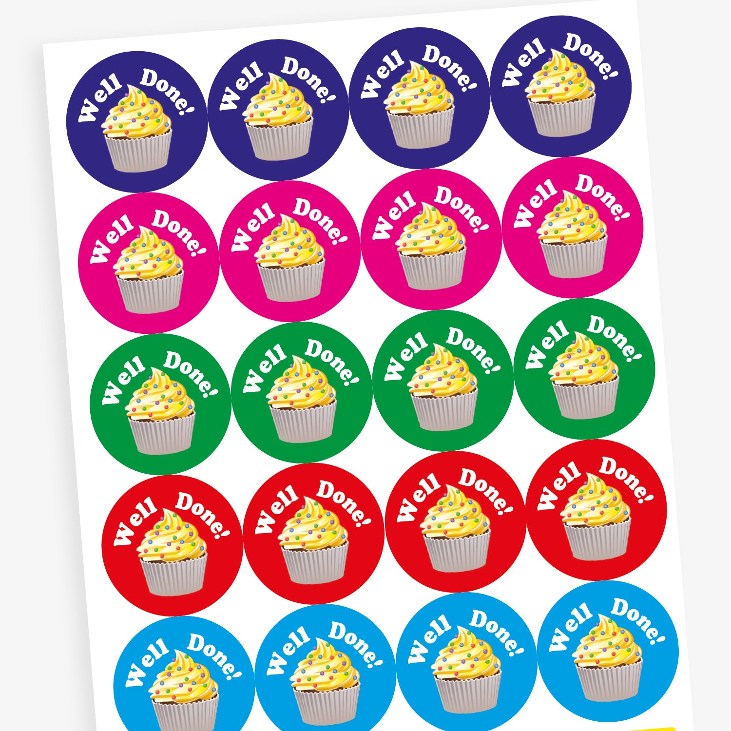 Overview of sheet of circular, vanilla scented stickers, each with a cupcake with vanilla frosting as the main image below the phrase 'Well Done!'.  Colourful backgrounds of blue, magenta, cyan, red and green are shown.