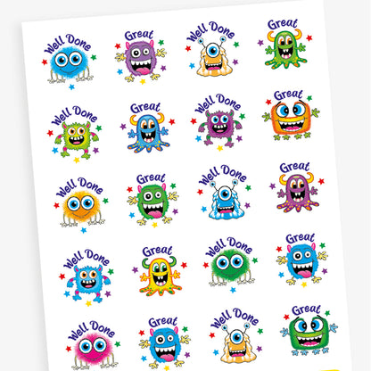 A sheet of 32mm circular stickers featuring colourful cartoon monsters with expressive faces, each accompanied by motivational phrases such as 'Well Done' and 'Great', designed to be berry-scented when rubbed.