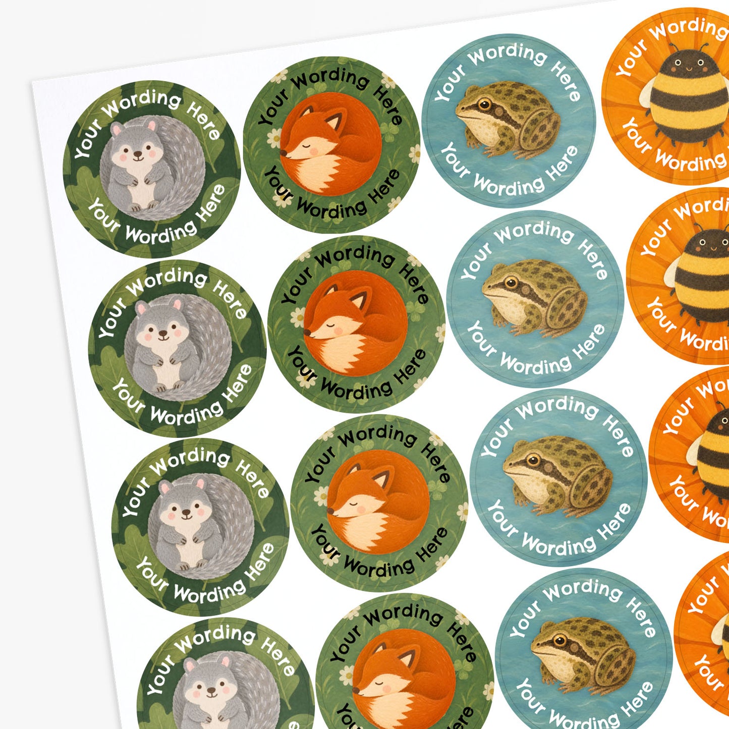 A sheet of circular nature-themed custom stickers featuring animal illustrations including a hedgehog, fox, frog, and bee with placeholder text that reads 'Your Wording Here'.