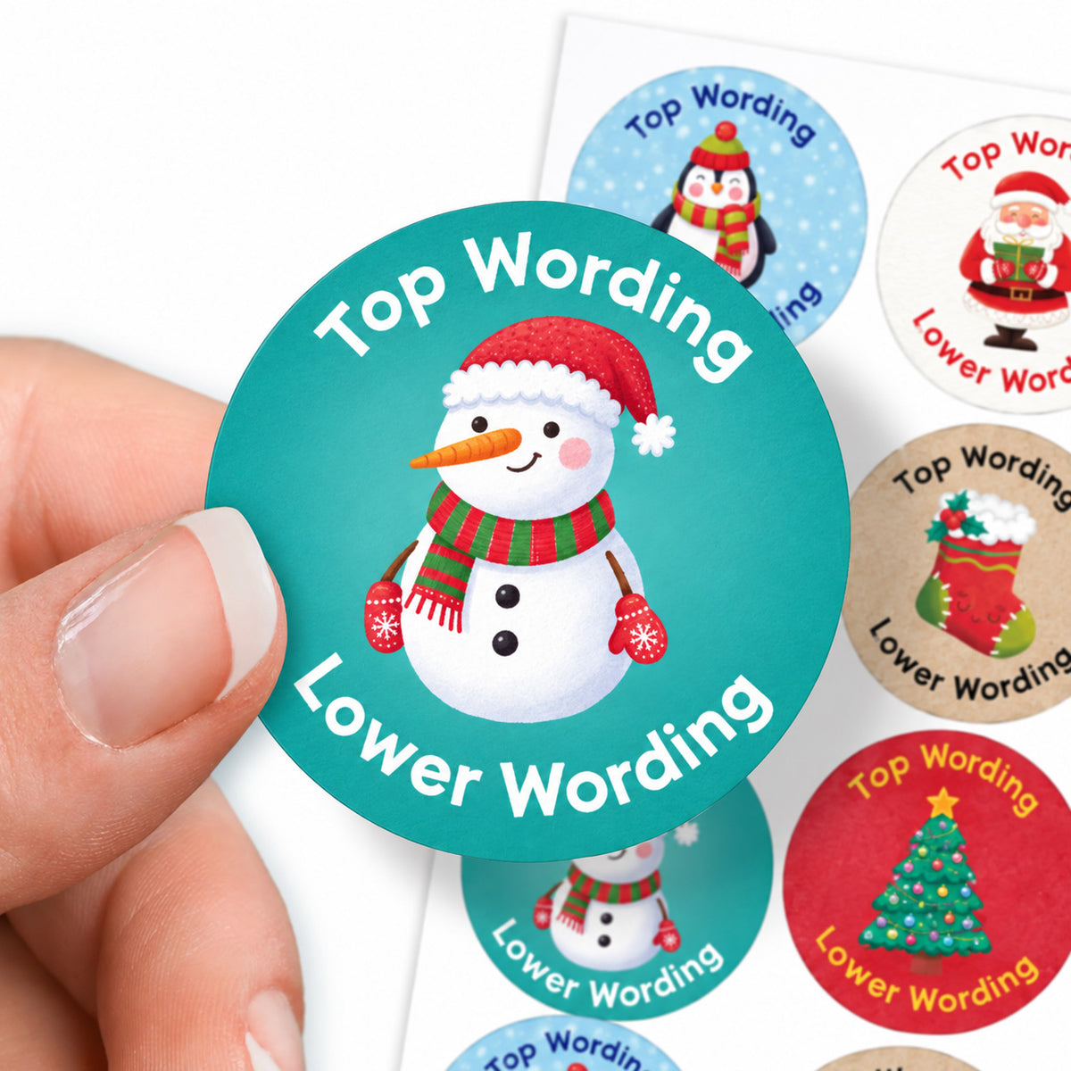 Personalised Christmas stickers held by hand featuring festive snowman design