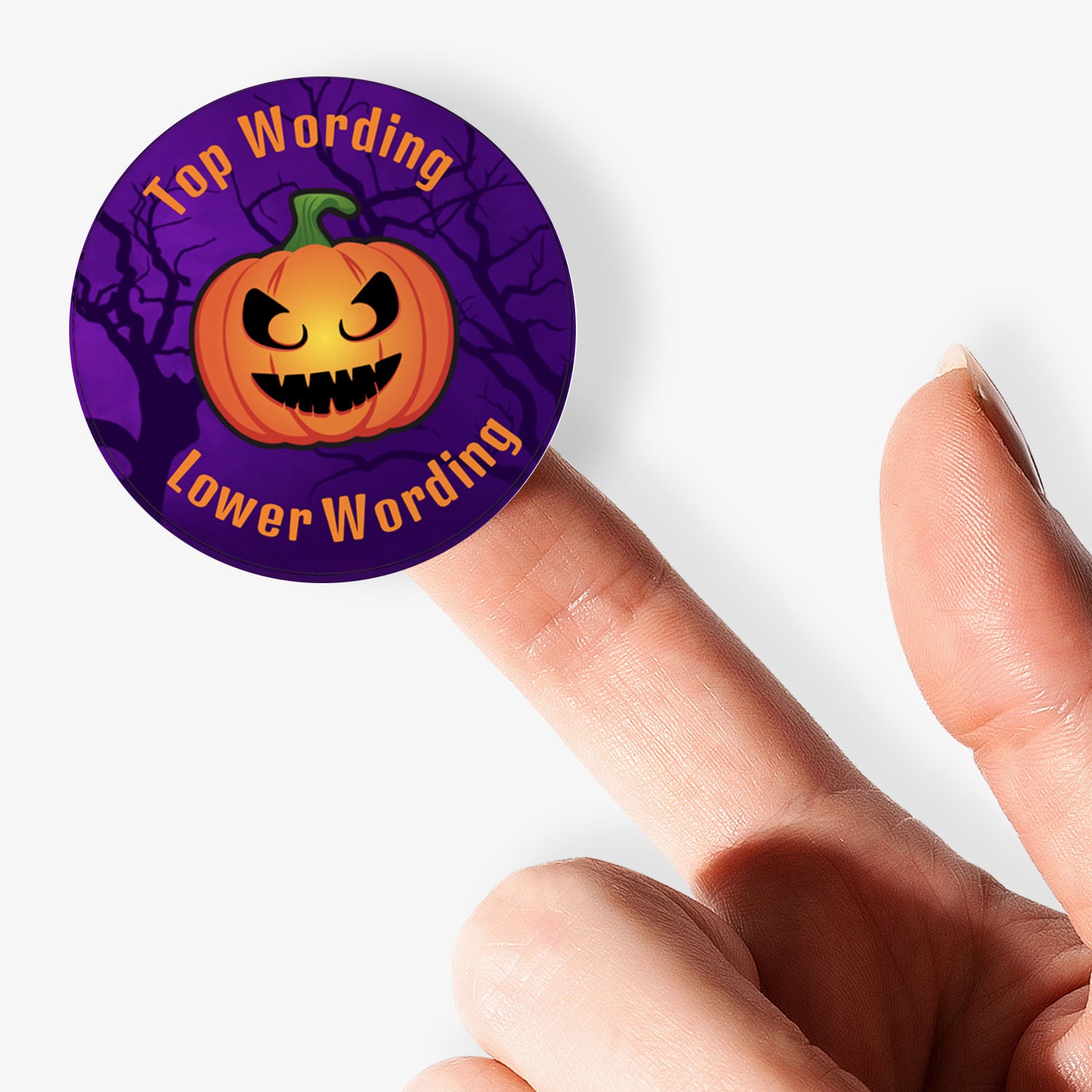 Purple haloween pumpkin sticker with 'Top Wording and lower wording' text held by a hand.