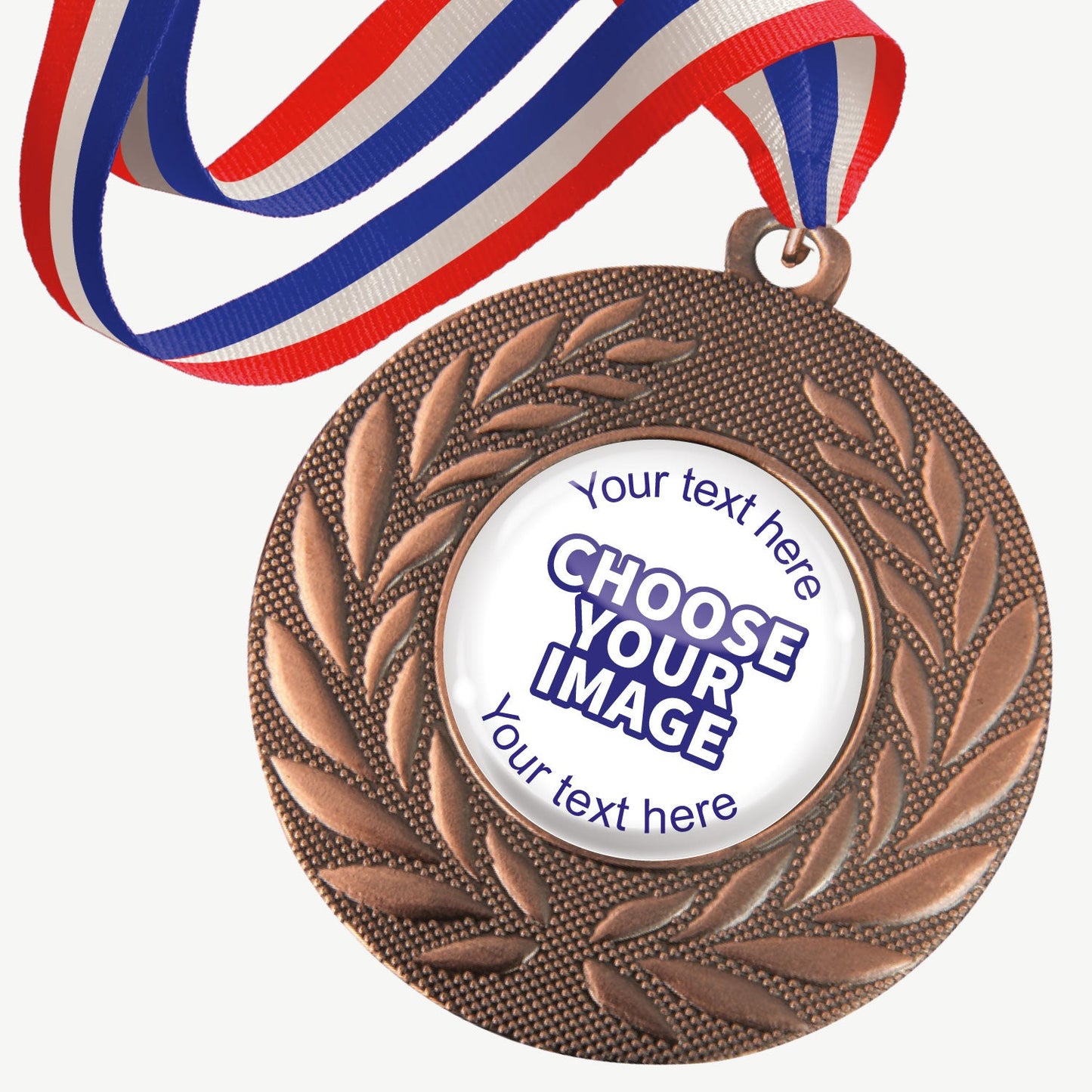 A set of ten bronze-coloured metal medals, each featuring a central 25mm circular area for custom designs, encased in a clear, glossy dome; surrounded by a laurel wreath pattern and attached to a red, white and blue striped ribbon; designed for personalisation with text and images, ideal for sporting events and achievements.