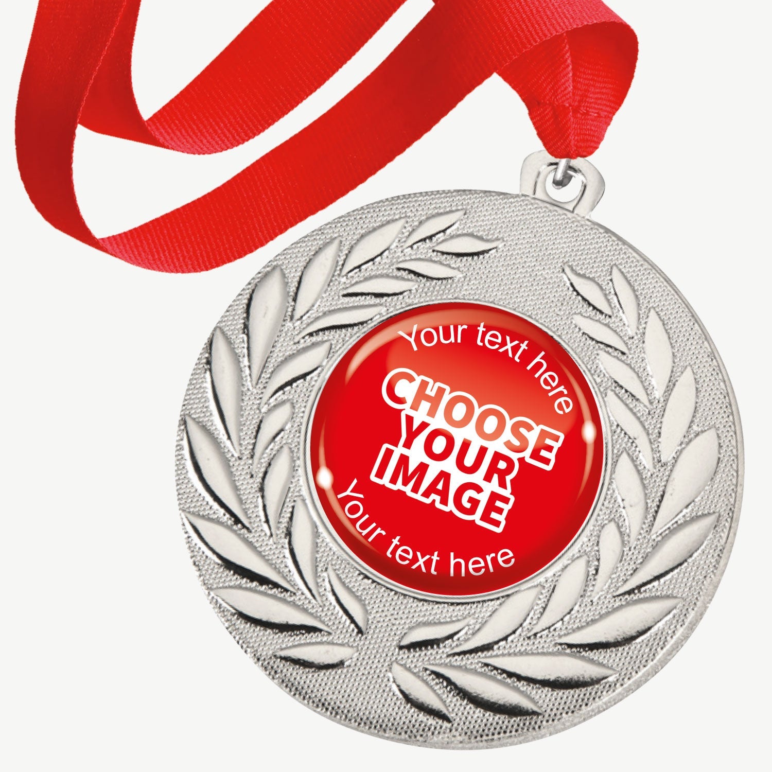 A set of ten silver-coloured metal medals, each featuring a central 25mm circular area for custom designs, encased in a clear, glossy dome; surrounded by a laurel wreath pattern and attached to a red ribbon; designed for personalisation with text and images, ideal for sporting events and achievements.