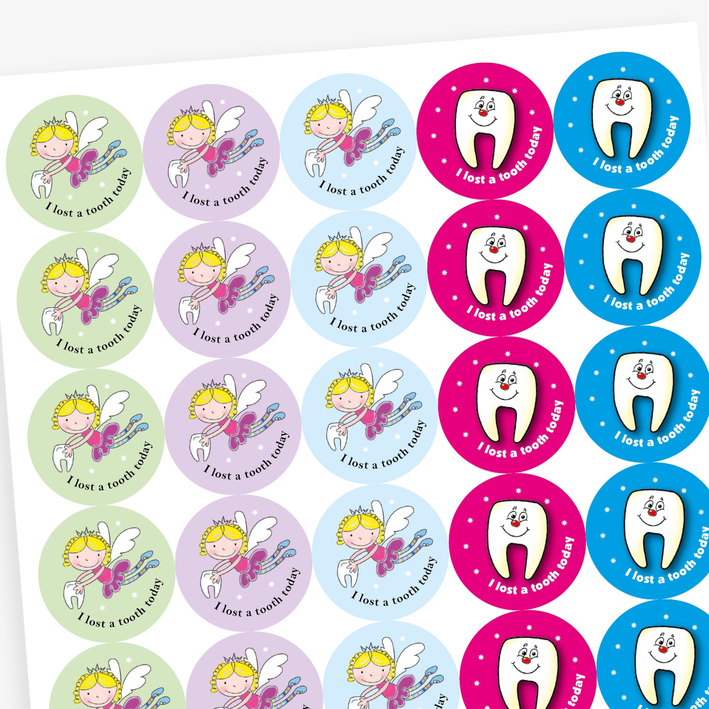 Overview of a sheet of circular stickers with pastel coloured backgrounds all saying 'I lost a tooth today'.  Each sticker has the main image of the tooth fairy flying and carrying a tooth.